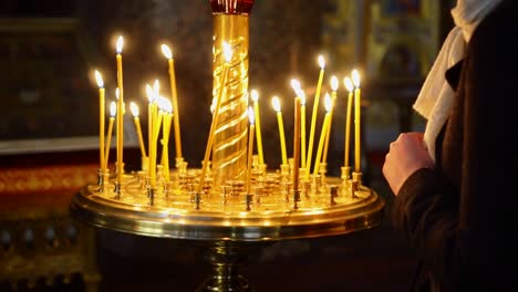 Metal-candle-light-cresset-in-church.