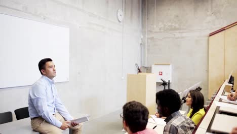 group-of-students-and-teacher-in-lecture-hall