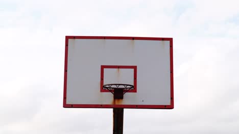 Basketball-basket-on-clouds-sky-background