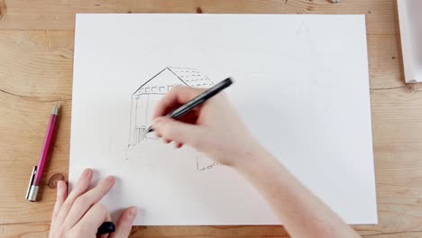 Timelapse-of-artist-drawing-a-house