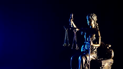 The-Statue-of-Justice---dark-blue-background