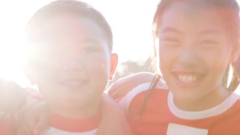 Head-And-Shoulders-Portrait-Of-Childrens-Sports-Team-In-Slow-Motion