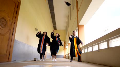 Black-graduates-wear-black-suits-on-graduation-day-at-university.