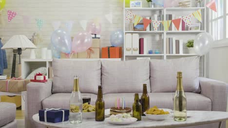 birthday-cake-with-colorful-candles-on-table