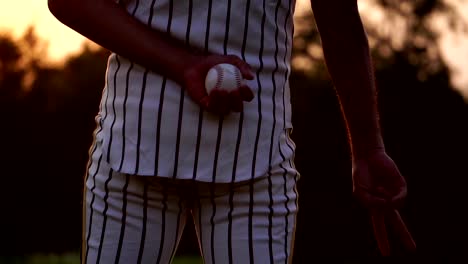 Baseball-Men-are-hand-signals-to-his-teammates-before-throwing-a-baseball