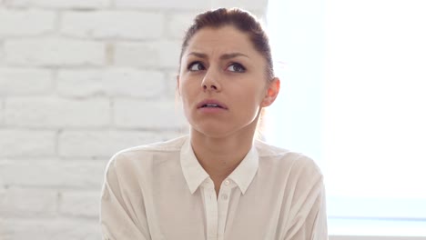 Confused-Scared-Woman-in-Office