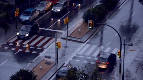 Red-to-green-traffic-light-on-a-rainy-day