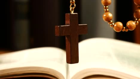 Wooden-Rosary-Hanging-in-Front-of-Library.Panning.