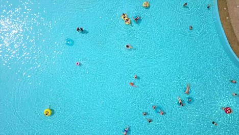 summer-day-famous-waterpark-outdoor-swimming-pool-aerial-down-view-panorama-4k