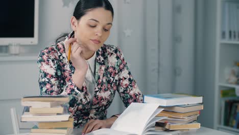 Tired-woman-with-a-pencil-prepare-for-exam