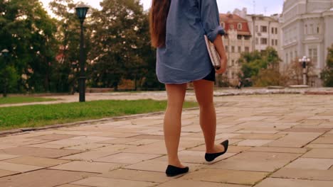 back-view-girl-walks-to-class