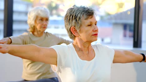 Senior-women-performing-yoga-4k