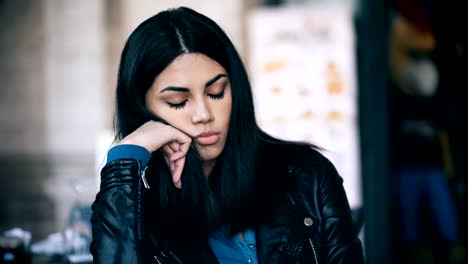 Close-Up-portrait-of--Young-Asian-Woman-Sad-And-Depressed