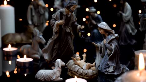 Pesebre-de-Navidad-de-escena-de-Navidad-con-luces-de-velas