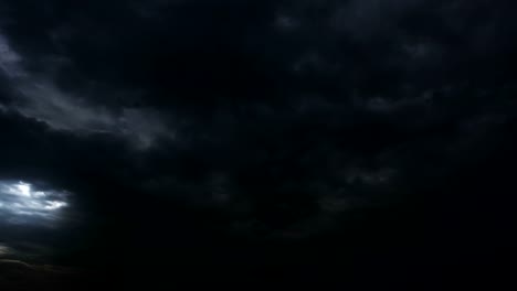 Thunderstorm-clouds-at-night-with-lightning.-4K-Timelapse-Loop.