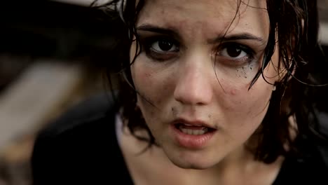 Teen-girl-crying-in-the-rain