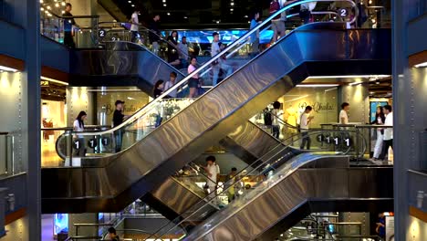 Crowded-Consumer-on-escalators-in-shopping-mall