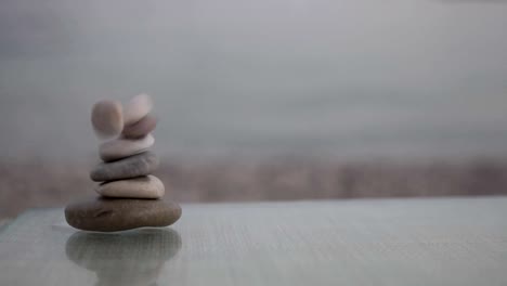 The-destruction-of-the-pyramid-of-stones-close-up,-slow-motion.