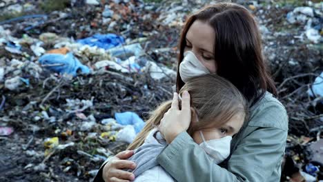 Woman-hugs-her-daughter.-Ecological-problem