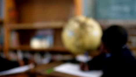 Schoolgirl-looking-at-camera-in-the-classroom-4k