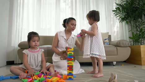 Mother-Playing-with-Daughters