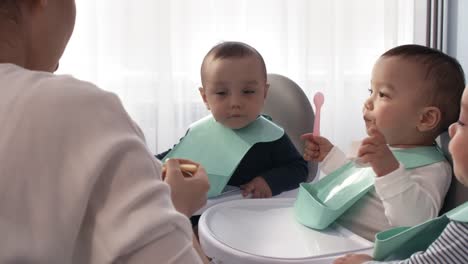 1-Year-Old-Identical-Twins-Eating-Baby-Food