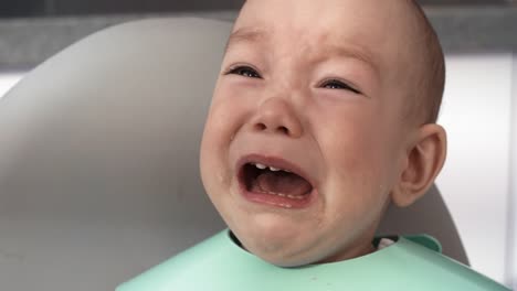 Stroppy-Asian-Baby-Crying-during-Feeding