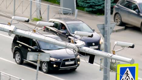 Closeup-of-four-traffic-security-camera-surveillance-CCTV-on-the-road-in-the-big-city