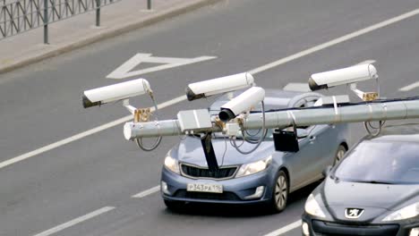 Closeup-of-four-traffic-security-camera-surveillance-CCTV-on-the-road-in-the-big-city