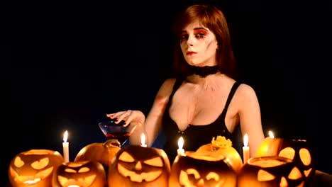 Woman-with-Halloween-pumpkins