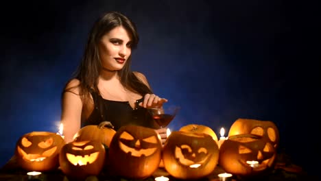 Woman-with-Halloween-pumpkins