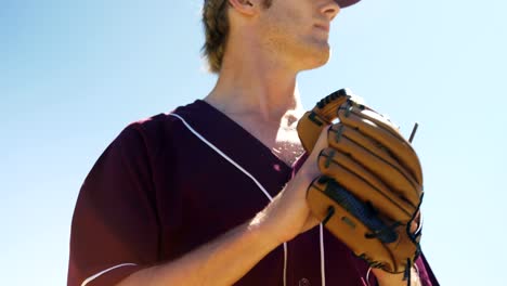 Baseball-players-holding-ball-during-practice-session