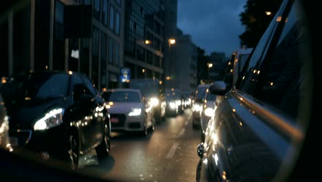 Rearview-Mirror-Traffic-Jam,-Motorcycle-Pulling-Up