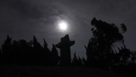 Tombstone-at-Cemetery-with-the-moon-in-south-korea