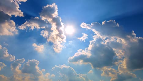 4K.Time-lapse-Moving-clouds-and-white-clouds-flying-on-blue-sky-with-sun-rays