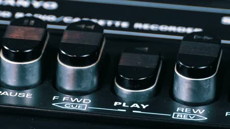 Pushing-Play-Button-on-a-Vintage-Tape-Recorder