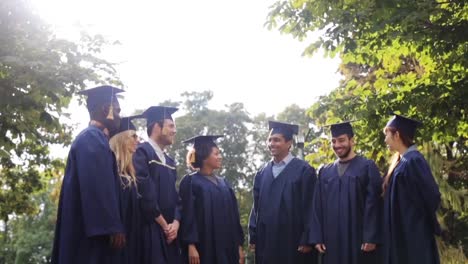 happy-students-throwing-mortar-boards-up