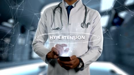 Hypertension---Male-Doctor-With-Mobile-Phone-Opens-and-Touches-Hologram-Illness-Word