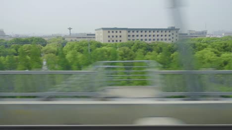 Weitergabe-Landschaft-asiatische-Hochgeschwindigkeitszug-High-Speed-Transport-Reisen-Grünanlagen