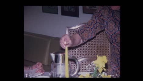 1971-Elderly-woman-lights-candles-to-start-Passover-seder