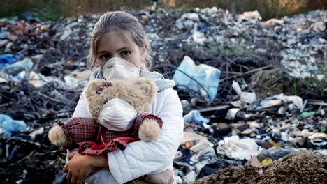 Young-girl-on-the-background-of-the-dump