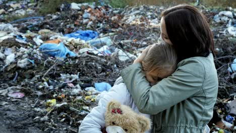 Mother-hugs-her-daughter.-Ecological-problem