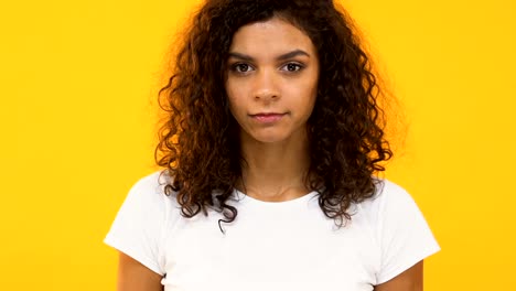 Young-girl-gesturing-stop,-saying-no-to-camera,-warning-of-bad-choice,-closeup