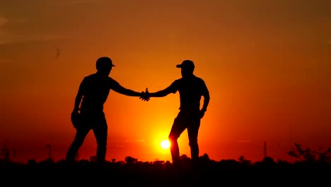 Silhouette-Baseball-zwei-Männer-mit-einem-Handschlag-koordiniert