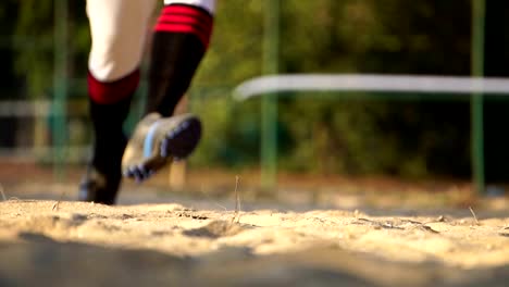 Baseball-player-slides-into-home-base