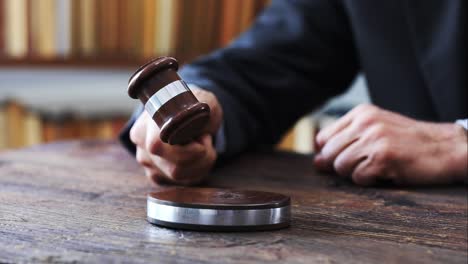 Judge-with-gavel-on-table