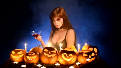 Woman-with-Halloween-pumpkins