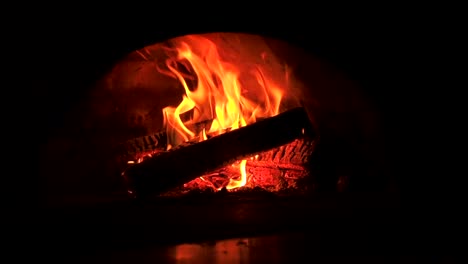 Beautiful-Fire-Close-Up-Slow-Motion.-Video-Clip-of-Burning-Firewood-in-the-Fireplace.-Firewood-Burn-in-the-wood-burning-stove.-30fps-Full-HD