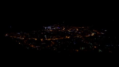 Panoramic-shot-of-The-City-of-Budva-at-night