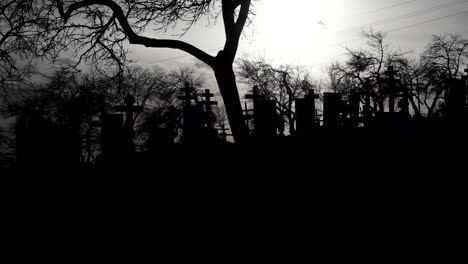 Old-Graveyard-with-Ancient-Crosses-at-sunset.-Scary-Cemetery